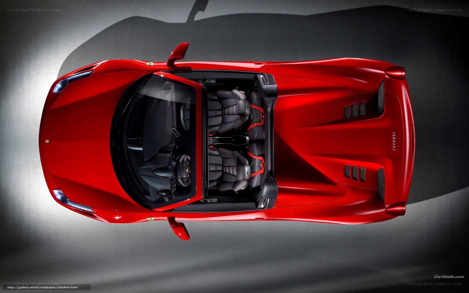 Red Ferrari convertible from above