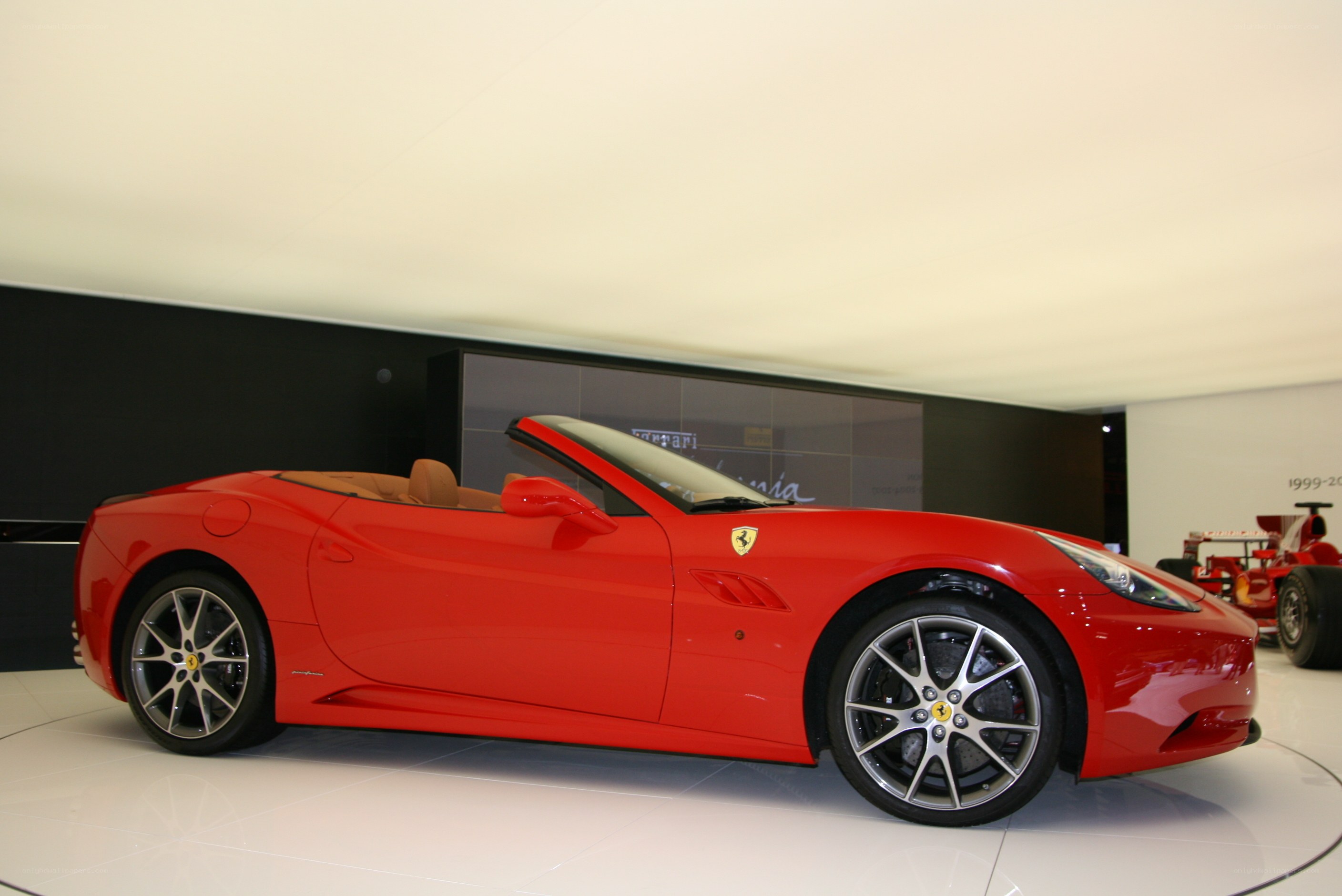 Red Ferrari convertible on display