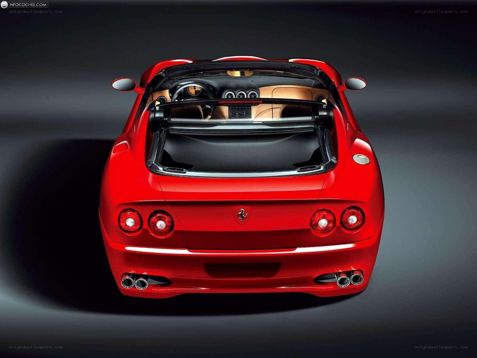 Red Ferrari convertible rear view