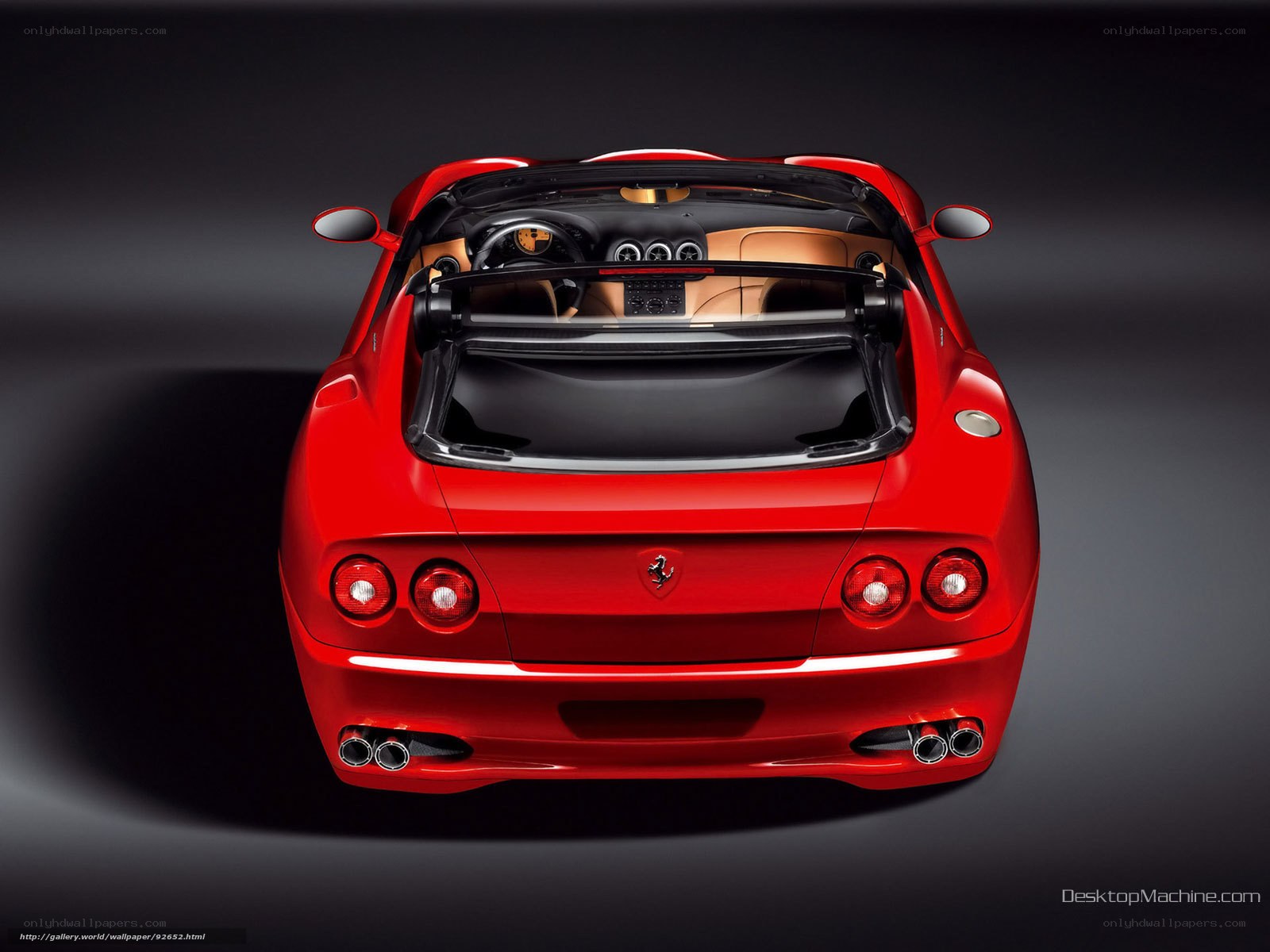 Red Ferrari convertible rear view