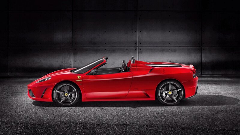 Red Ferrari convertible sports car