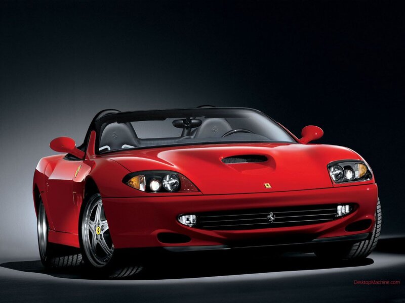 Red Ferrari convertible sports car
