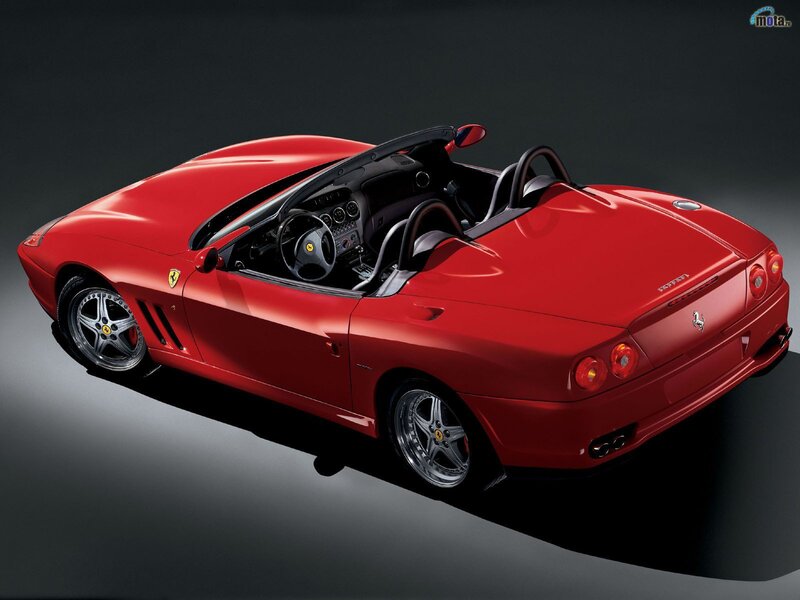 Red Ferrari convertible sports car