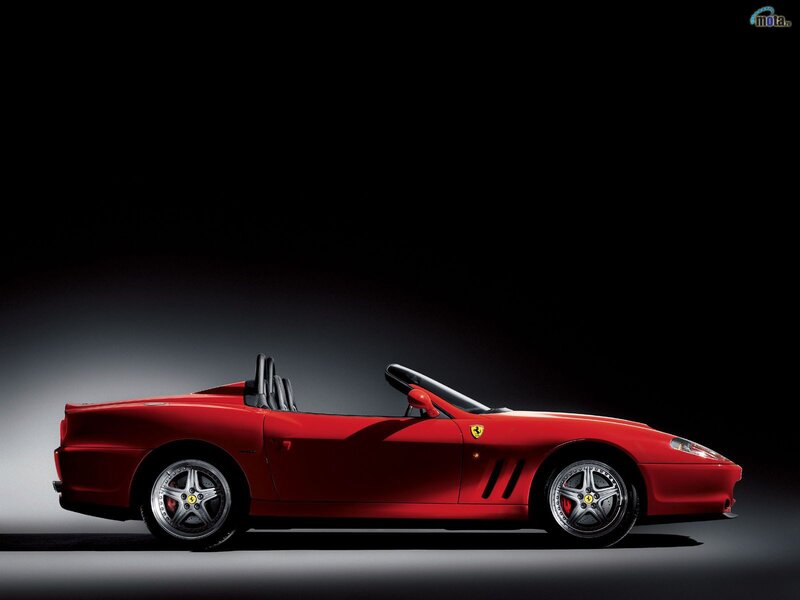 Red Ferrari convertible sports car