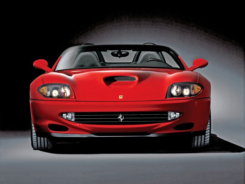 Red Ferrari convertible sports car