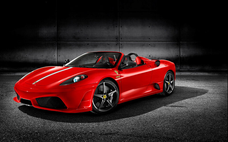 Red Ferrari convertible sports car
