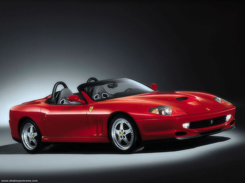 Red Ferrari convertible sports car