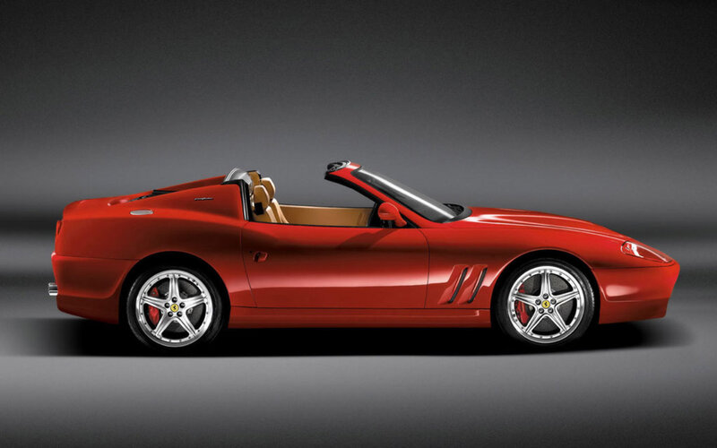 Red Ferrari convertible sports car