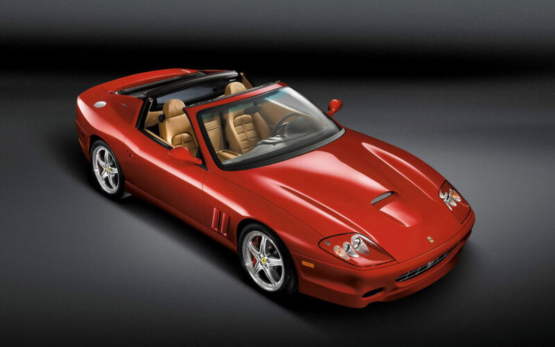 Red Ferrari convertible sports car