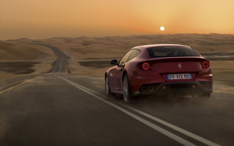 Red Ferrari Driving — Dramatic, Sunset