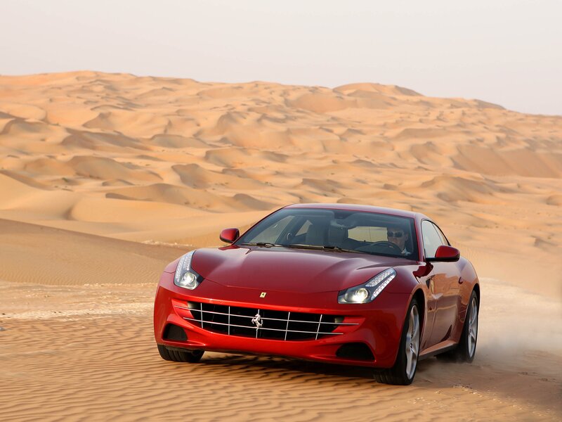 Red Ferrari Driving — Dynamic, Afternoon, Photograph, Car, Driver, Sand Dunes