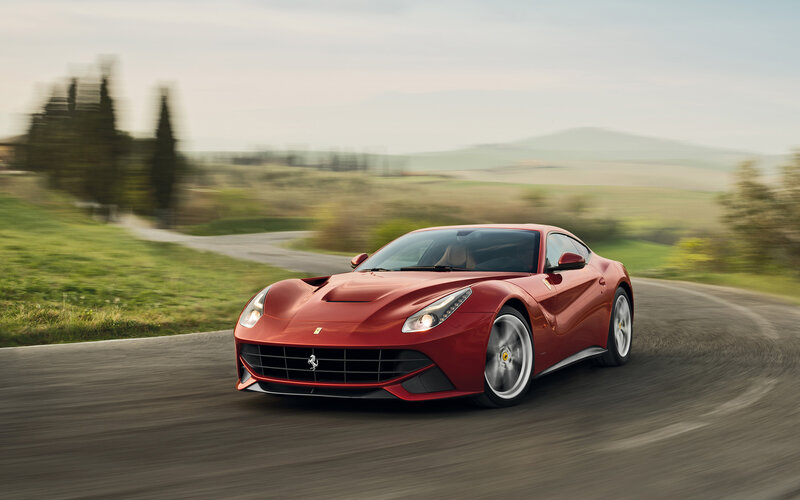 Red Ferrari Driving — Dynamic, Afternoon, Photograph