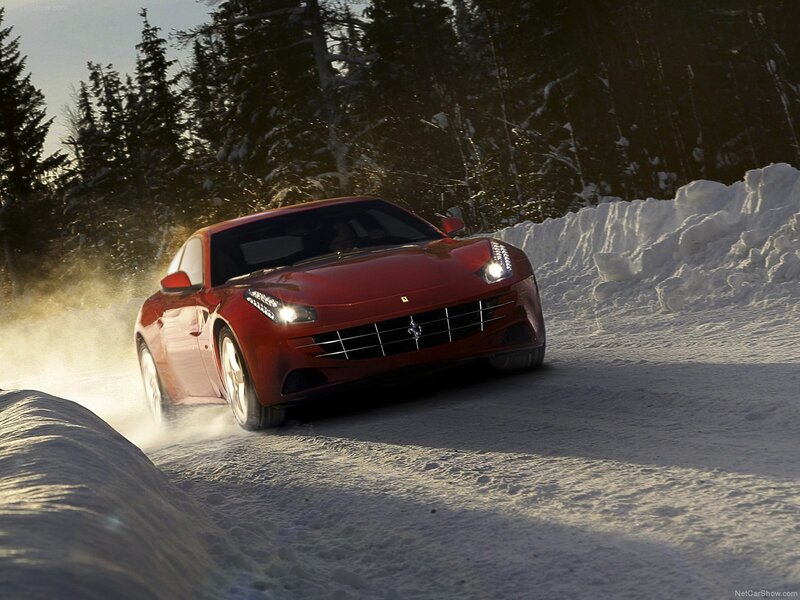 Red Ferrari Driving in Snow
