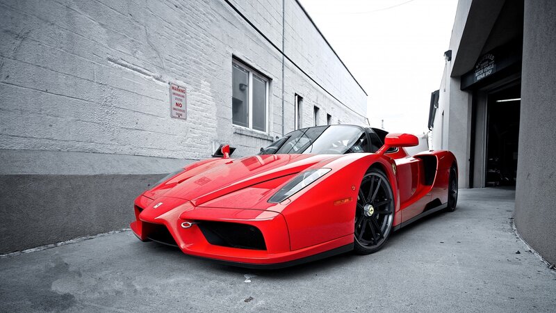 Red Ferrari Enzo — Dramatic, Photograph, Building