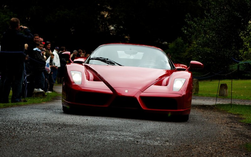 Red Ferrari Enzo — Dramatic, Photograph, People