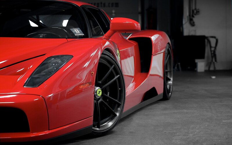 Red Ferrari Enzo in garage