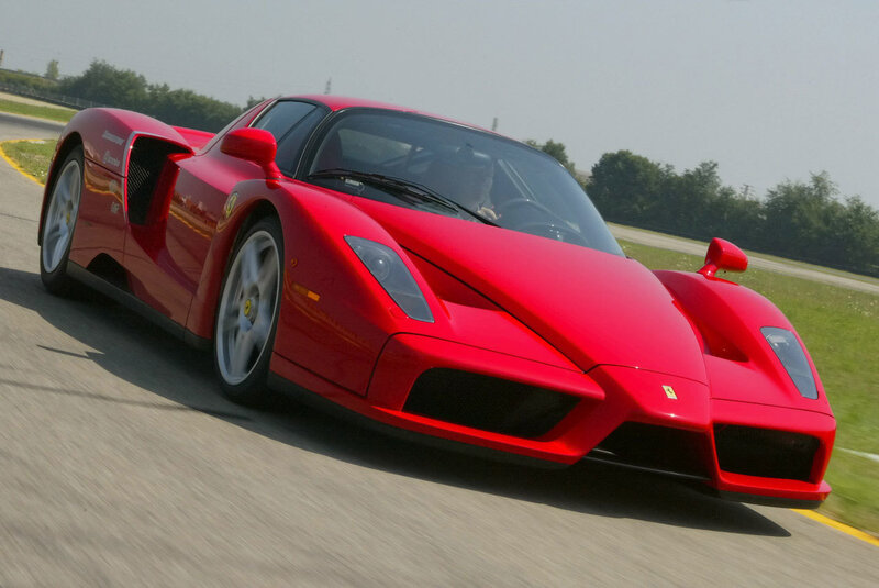 Red Ferrari Enzo on a racetrack