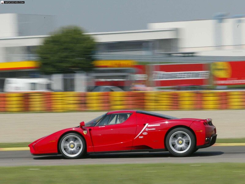 Red Ferrari Enzo on a racetrack