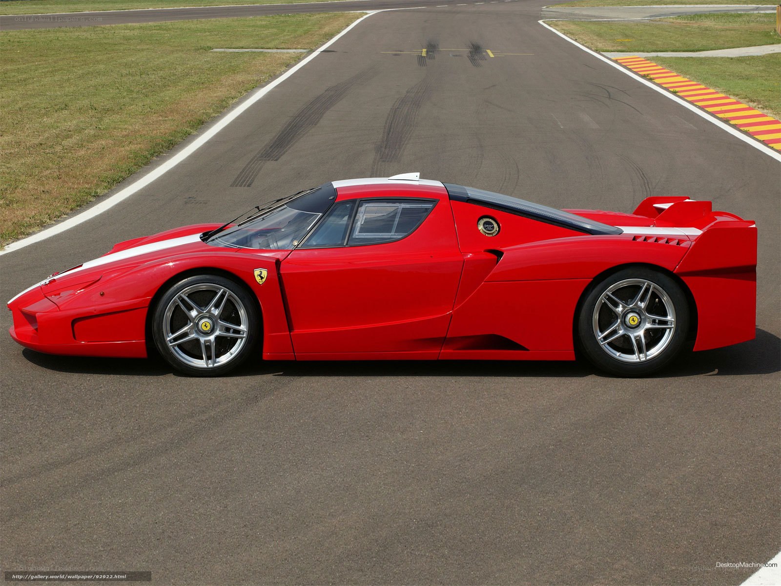 Red Ferrari Enzo on racetrack