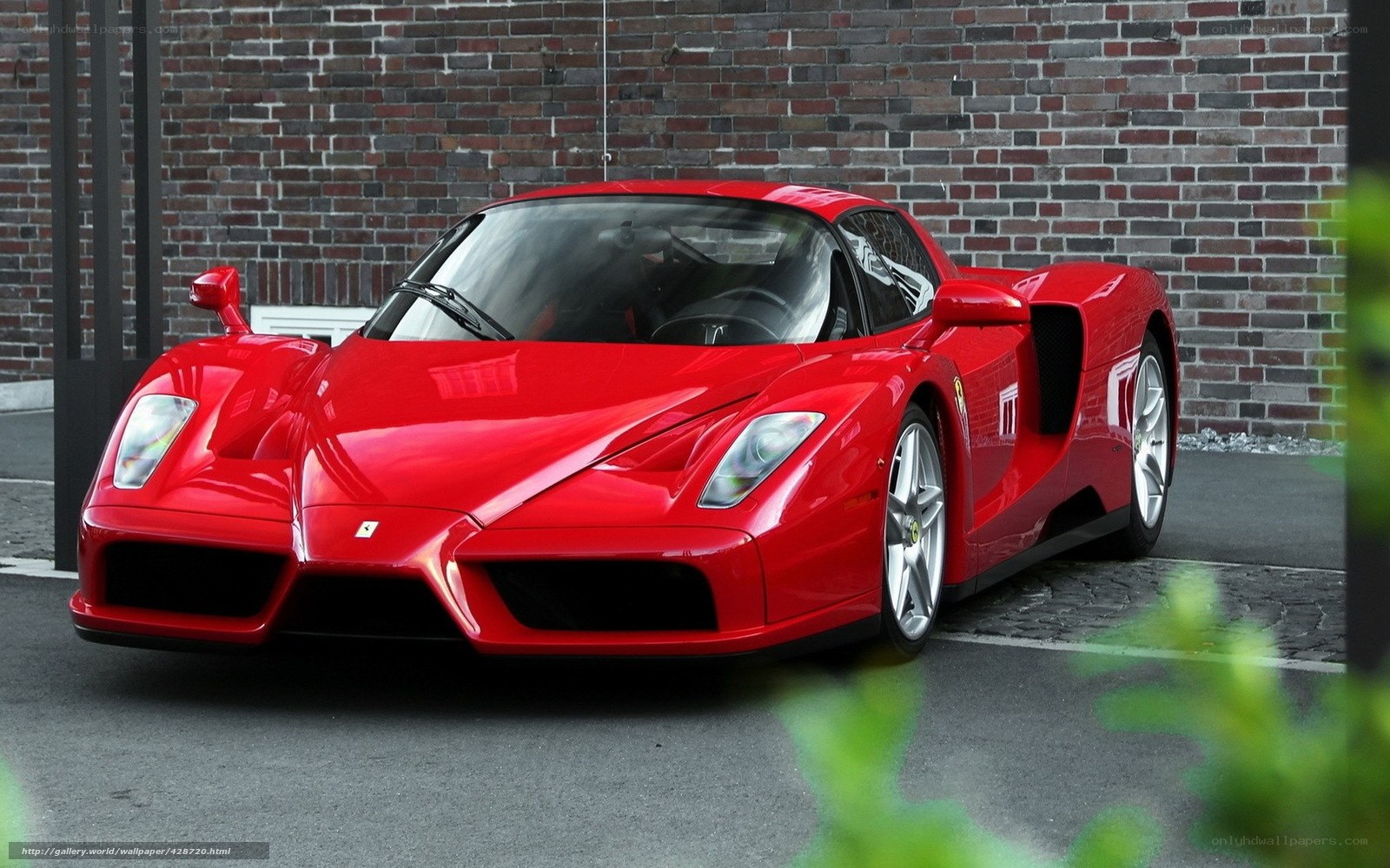 Red Ferrari Enzo parked