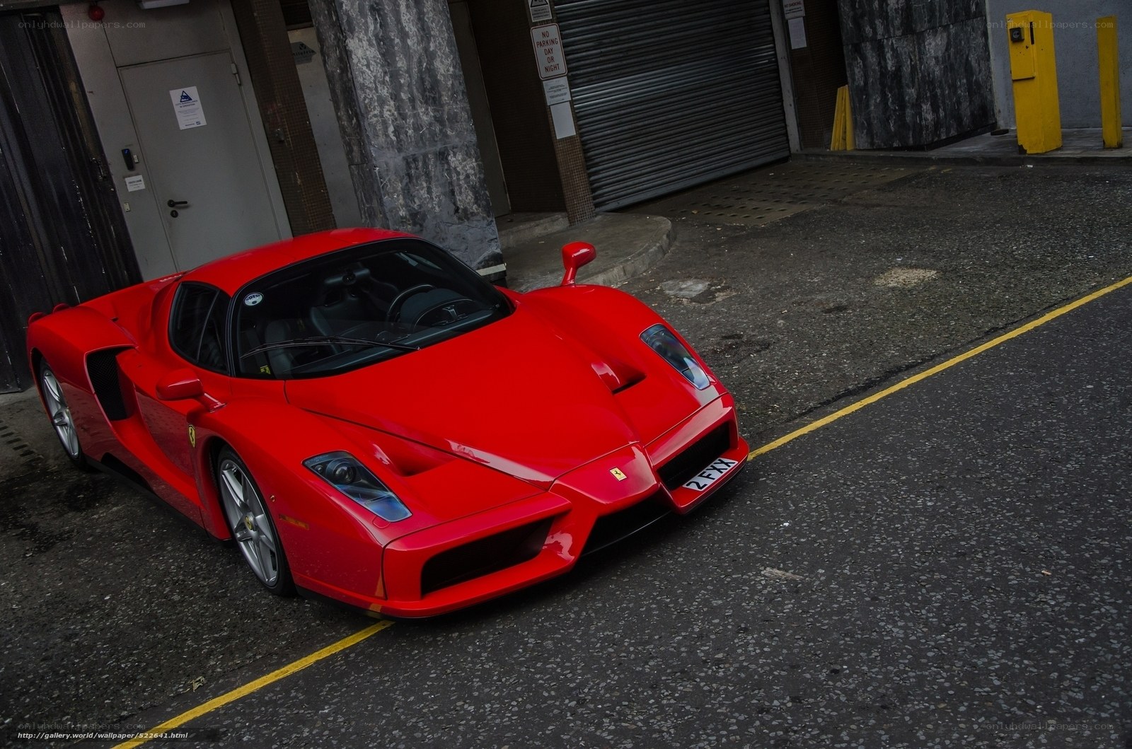 Red Ferrari Enzo parked