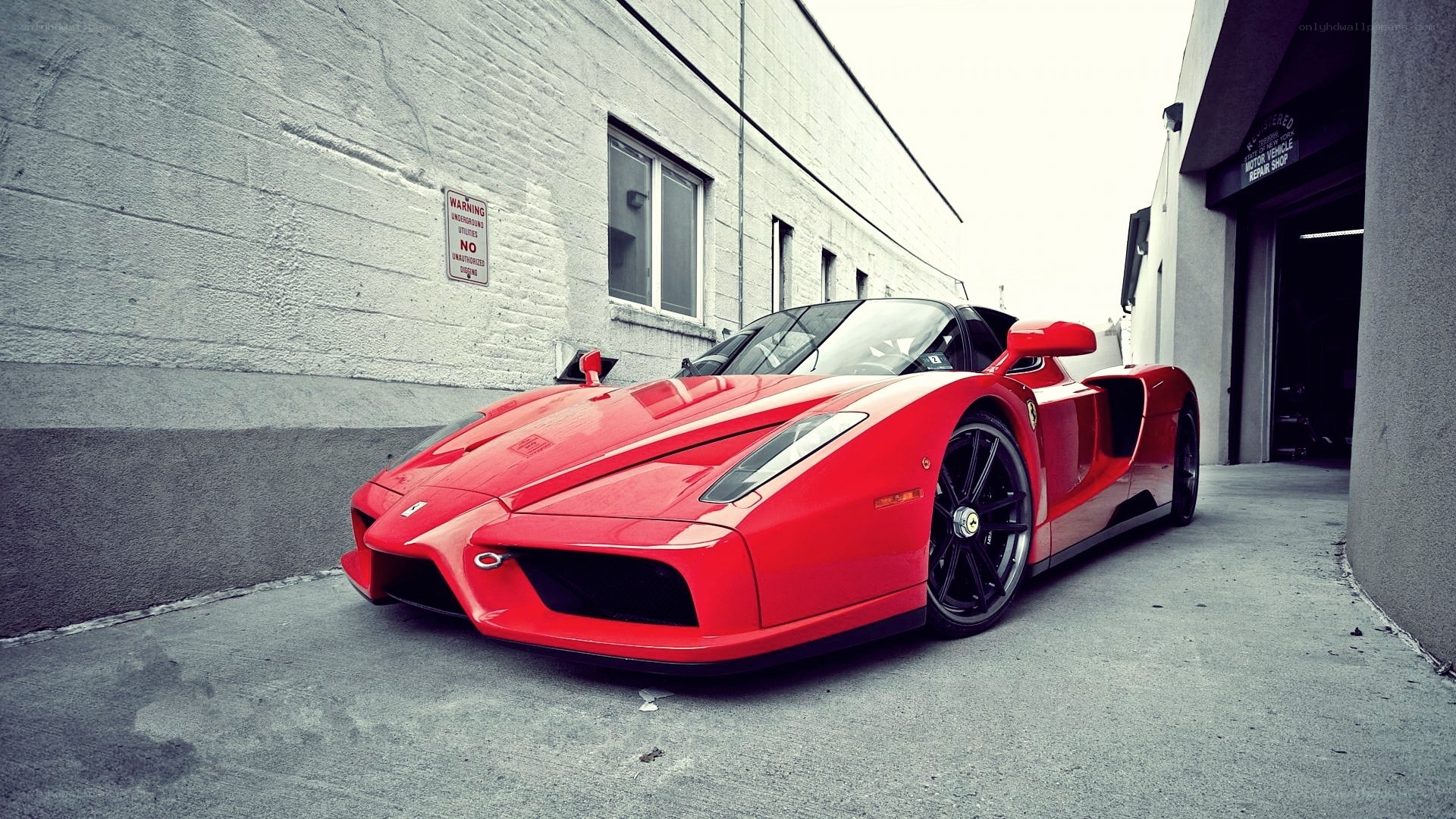 Red Ferrari Enzo parked