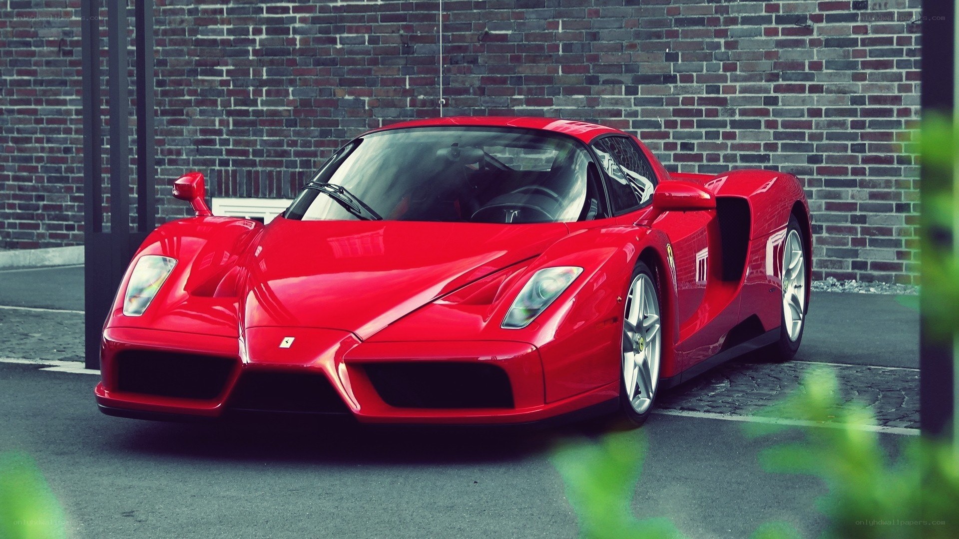 Red Ferrari Enzo parked