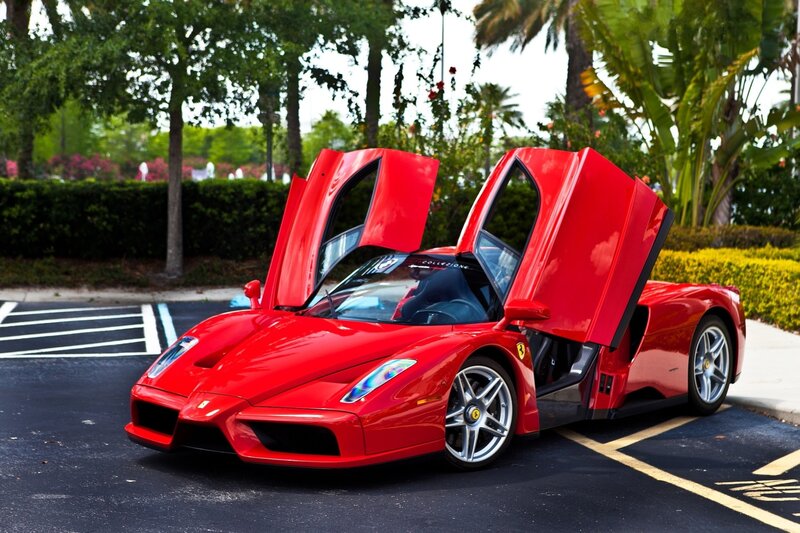 Red Ferrari Enzo with doors open