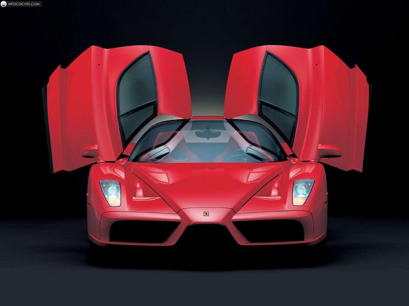 Red Ferrari Enzo with doors open