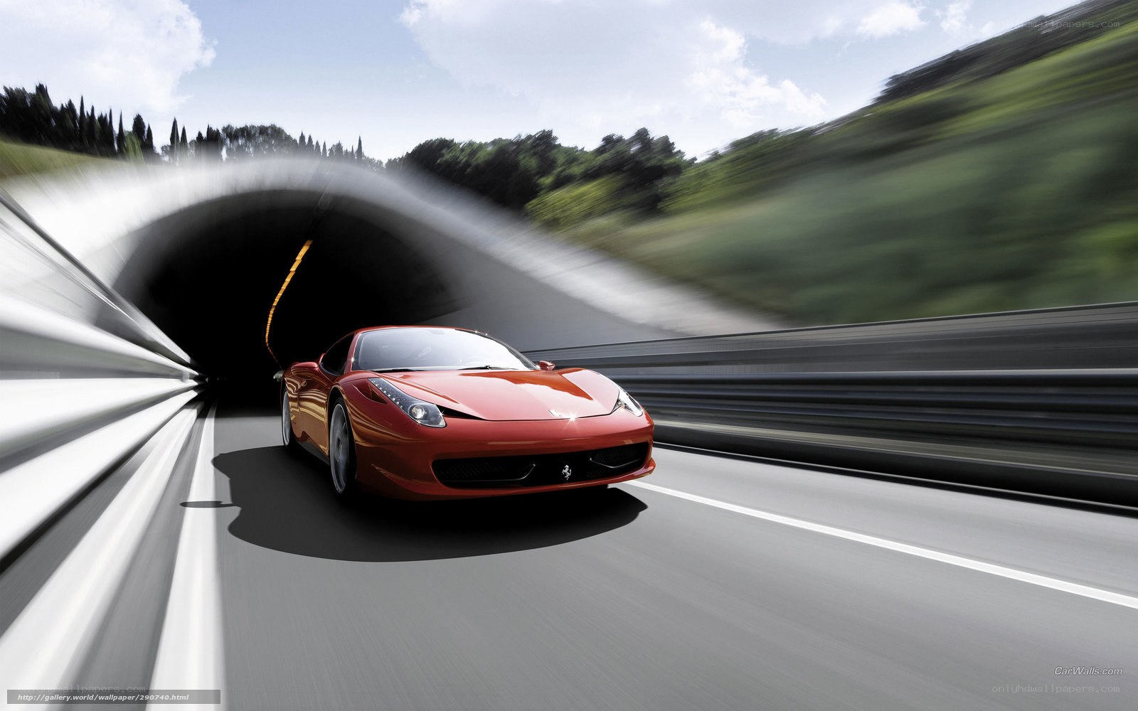 Red Ferrari exiting tunnel