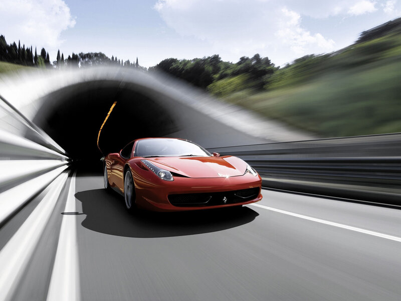 Red Ferrari Exiting Tunnel — Dynamic