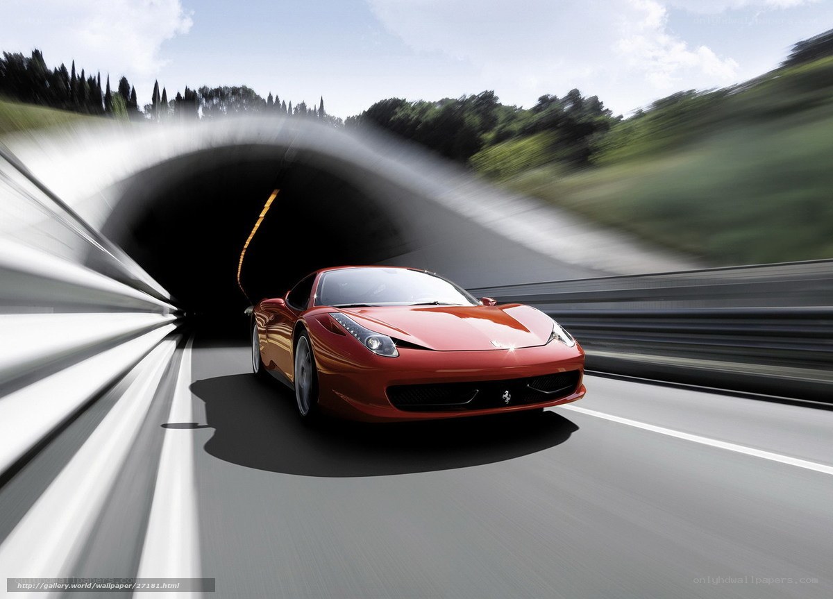 Red Ferrari exiting tunnel