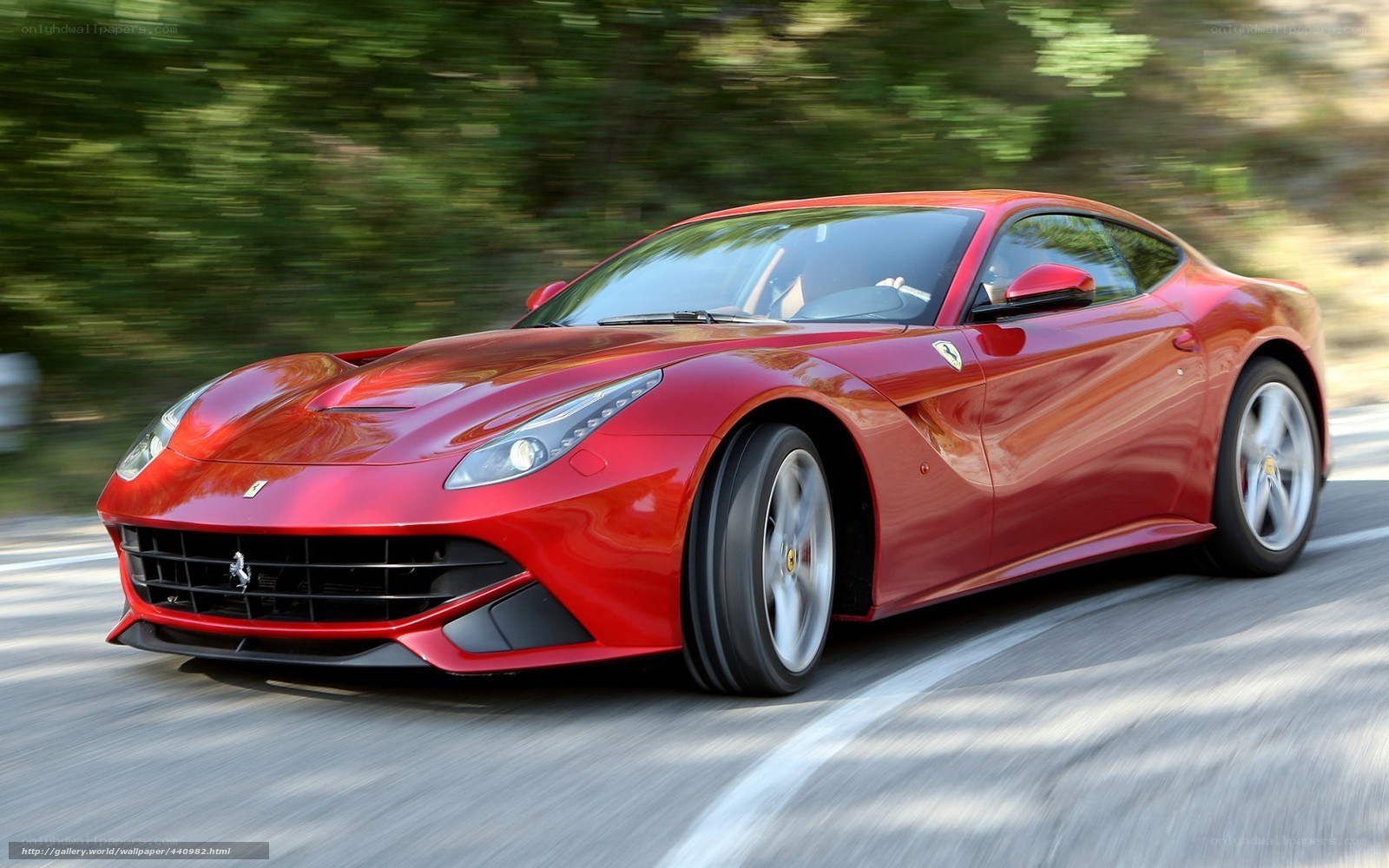 Red Ferrari F12 Berlinetta in motion
