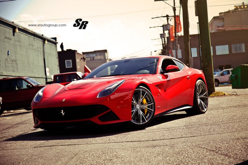 Red Ferrari F12 parked on street
