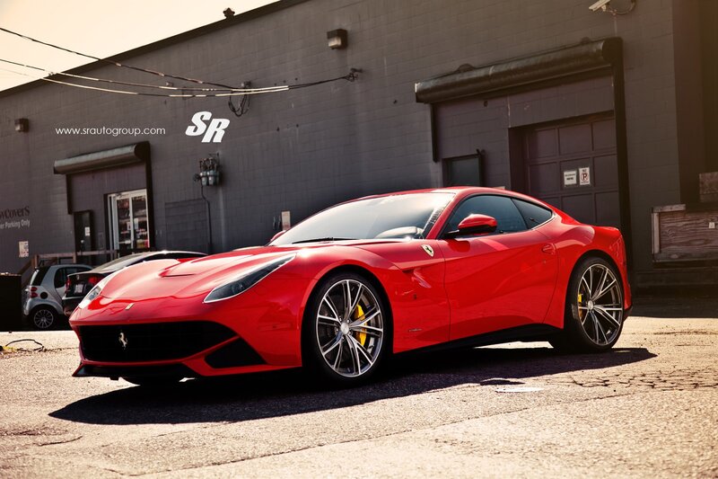 Red Ferrari F12 parked outside