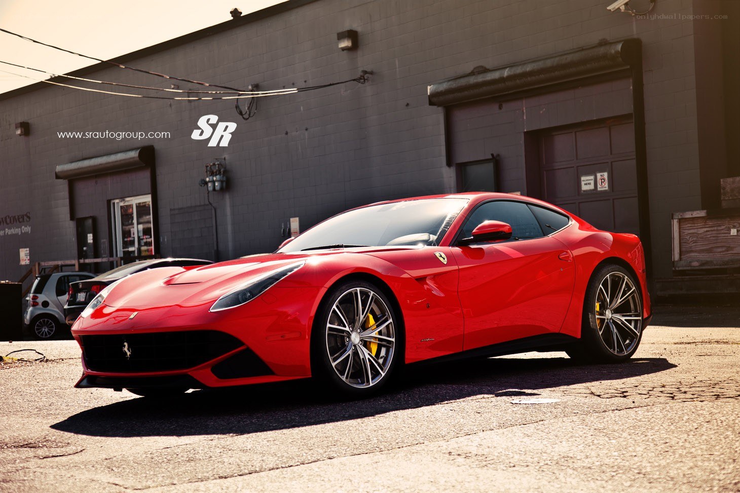 Red Ferrari F12 parked outside