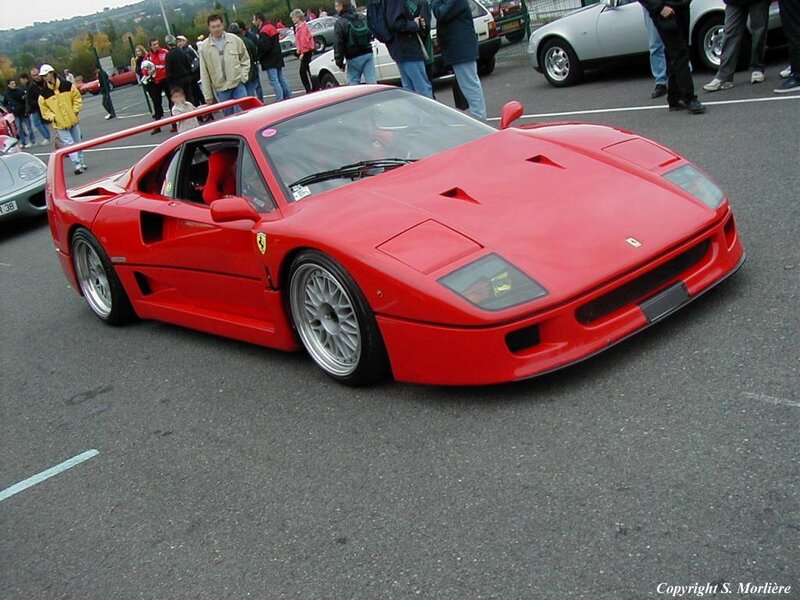 Red Ferrari F40 at a car show