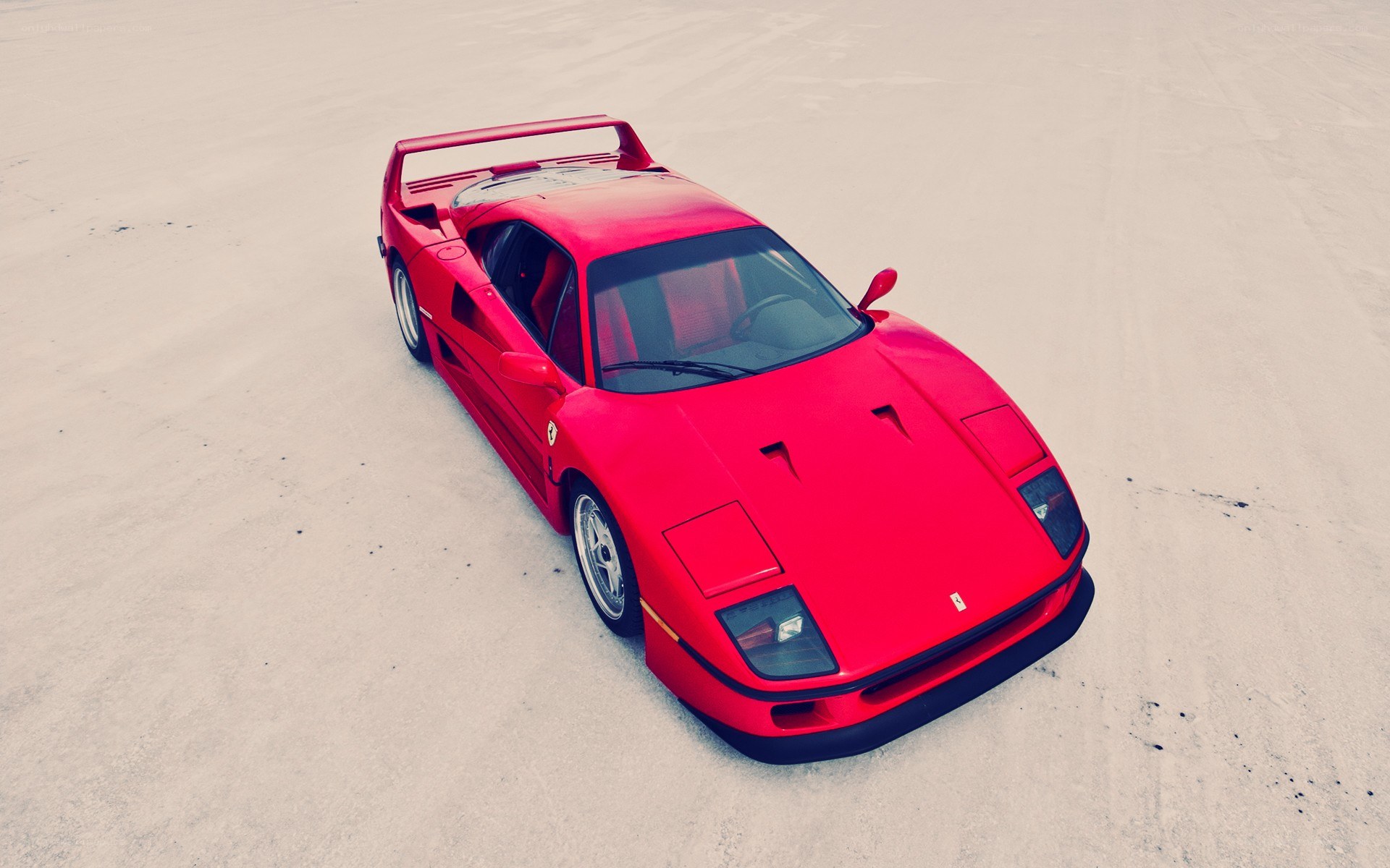 Red Ferrari F40 in desert