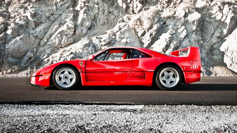Red Ferrari F40 on a road