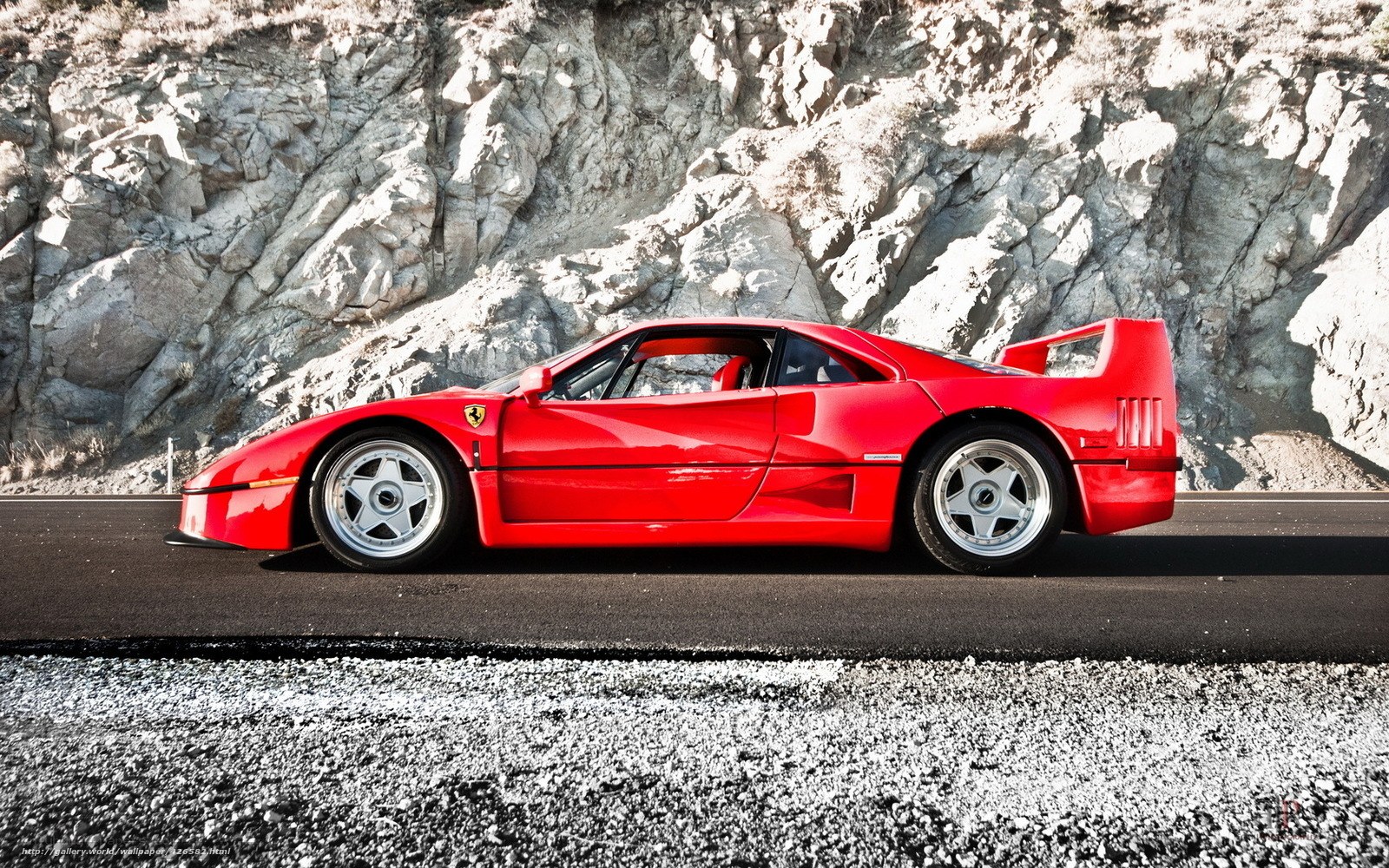 Red Ferrari F40 on a road