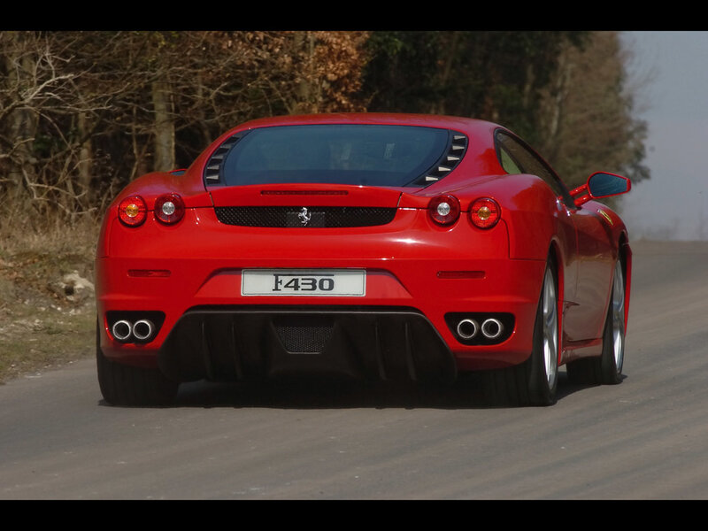 Red Ferrari F430 on a road