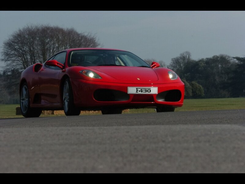 Red Ferrari F430 on track