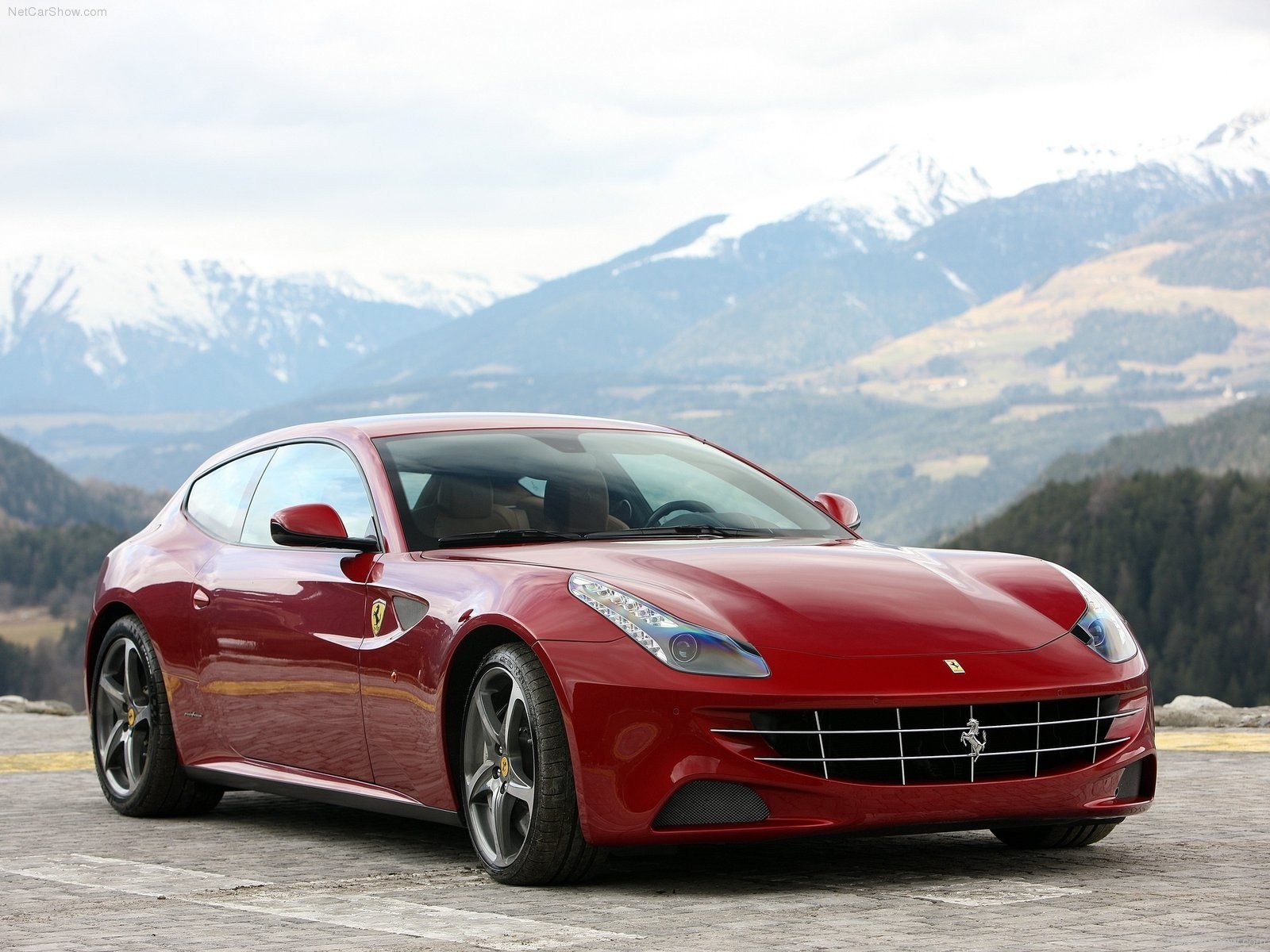 Red Ferrari FF on mountain road