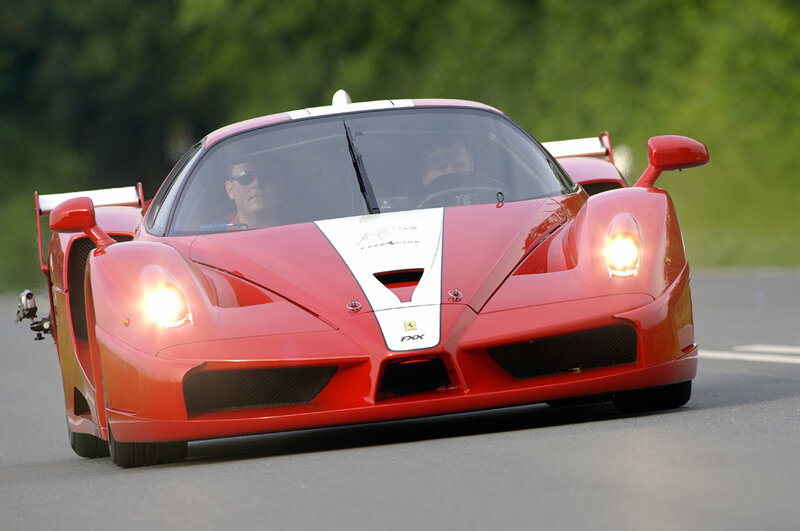 Red Ferrari FXX on a track