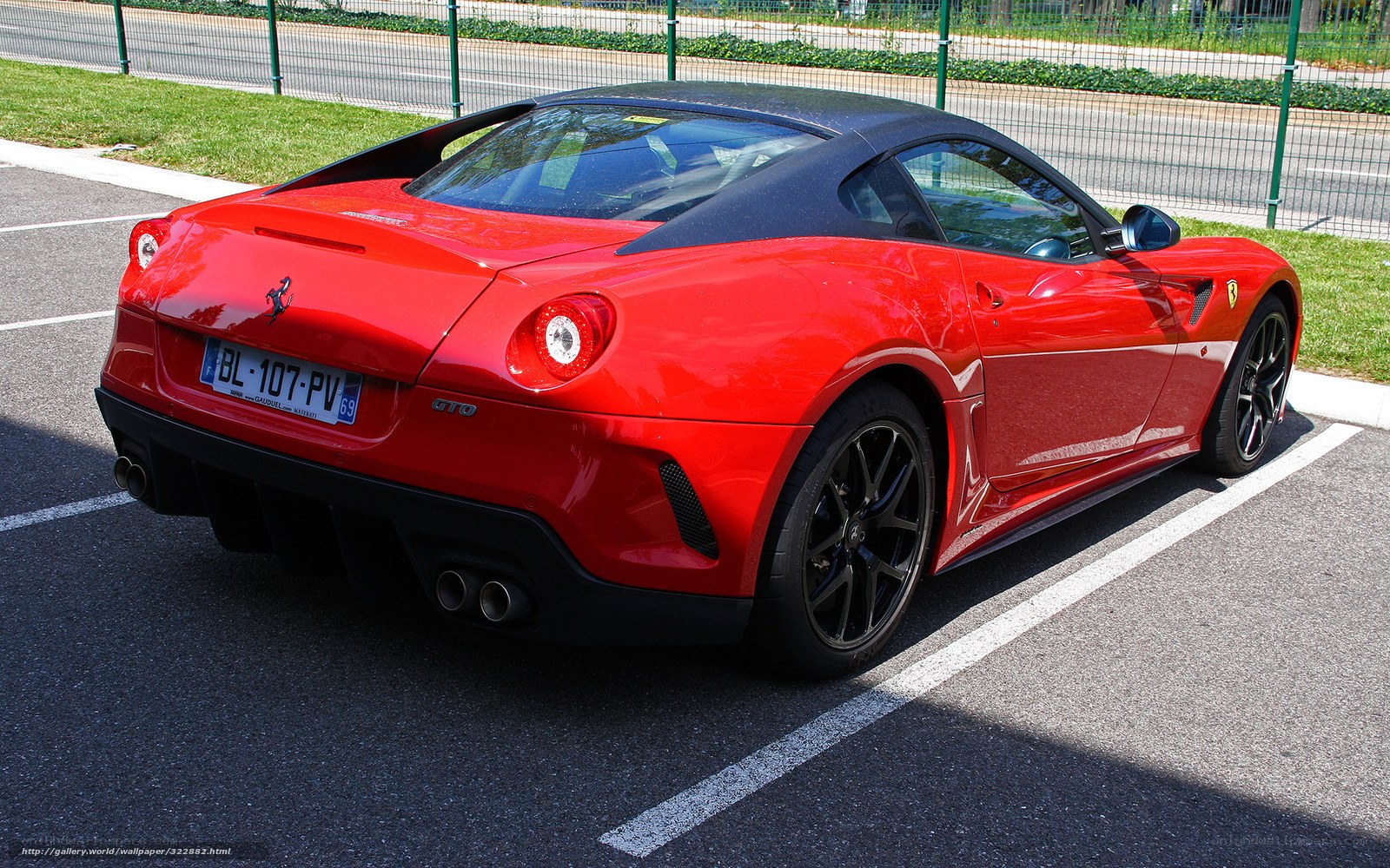 Red Ferrari GTO parked