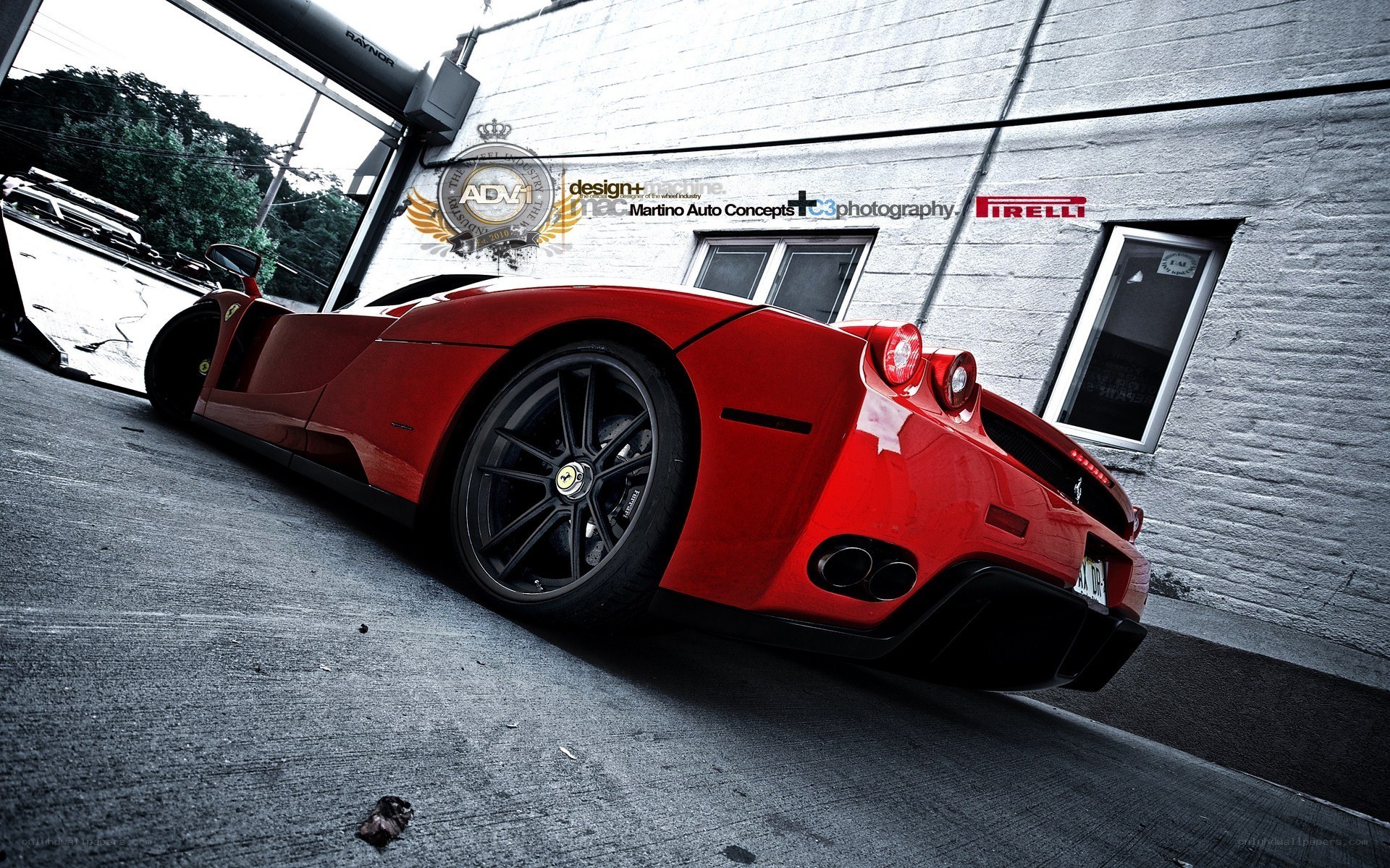 Red Ferrari in a garage