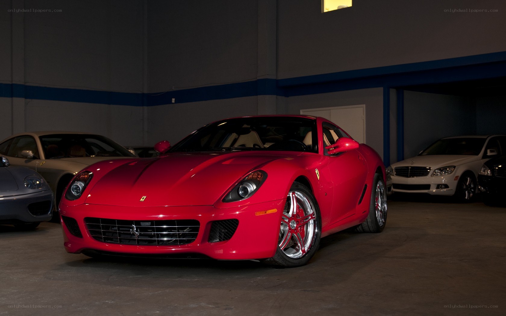 Red Ferrari in a garage