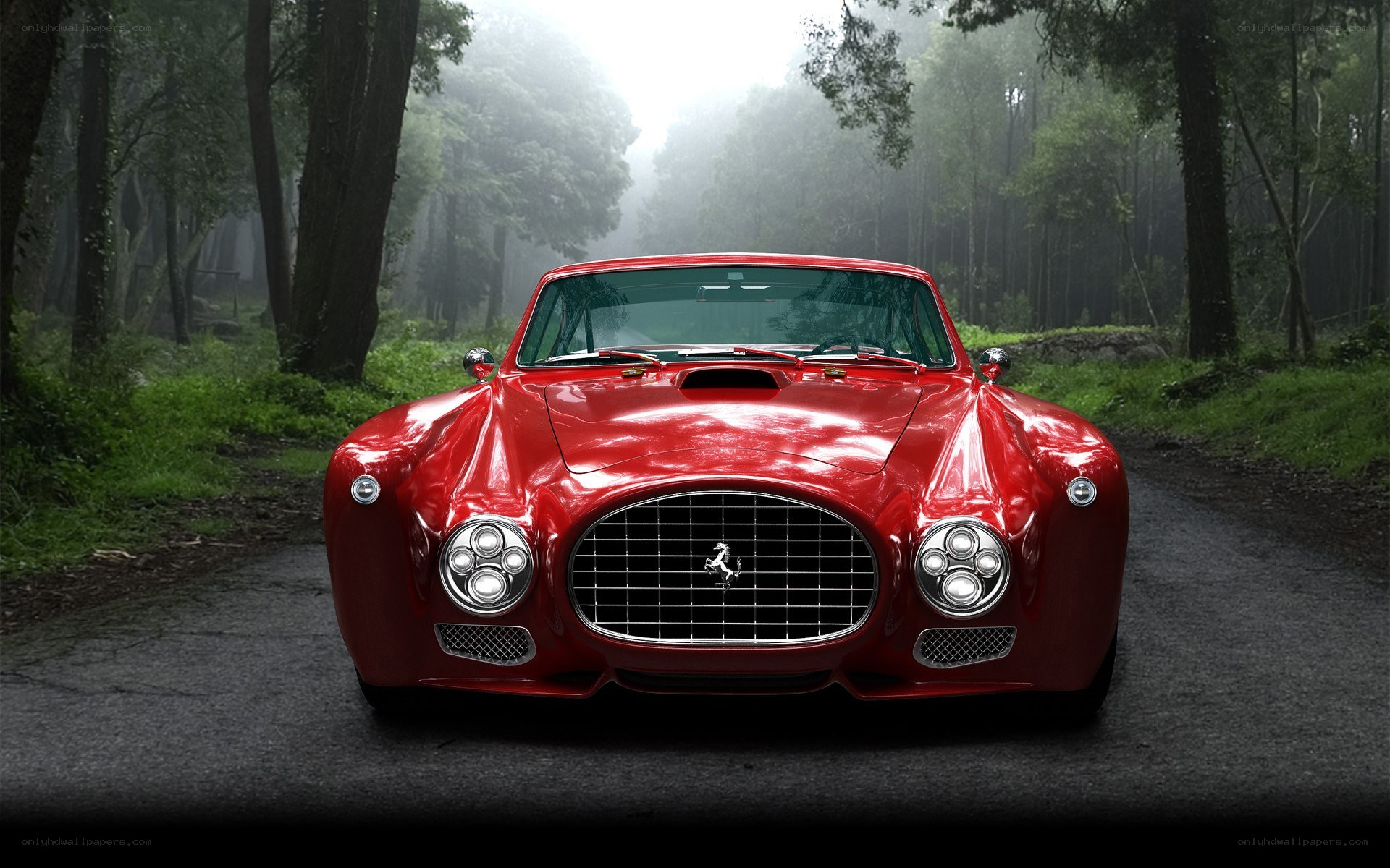 Red Ferrari in a misty forest