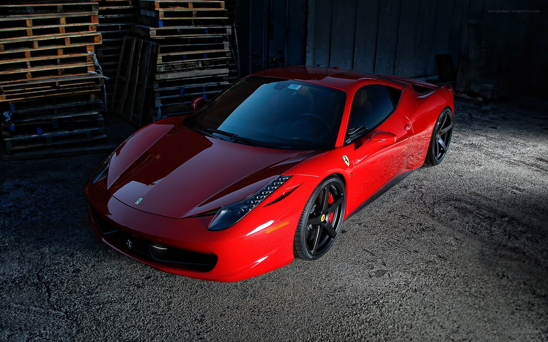 Red Ferrari in a warehouse
