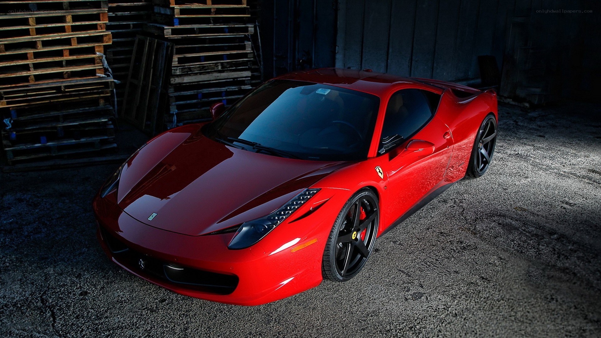 Red Ferrari in a warehouse